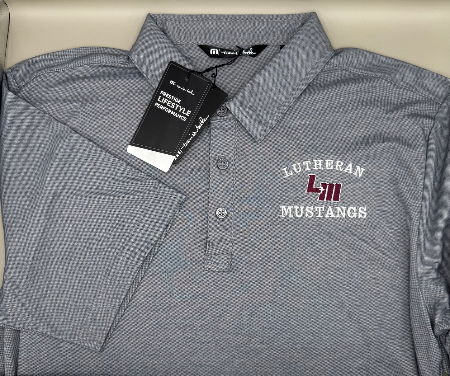LHS TravisMathew Oceanside Heather Polo with Embroidered Logo